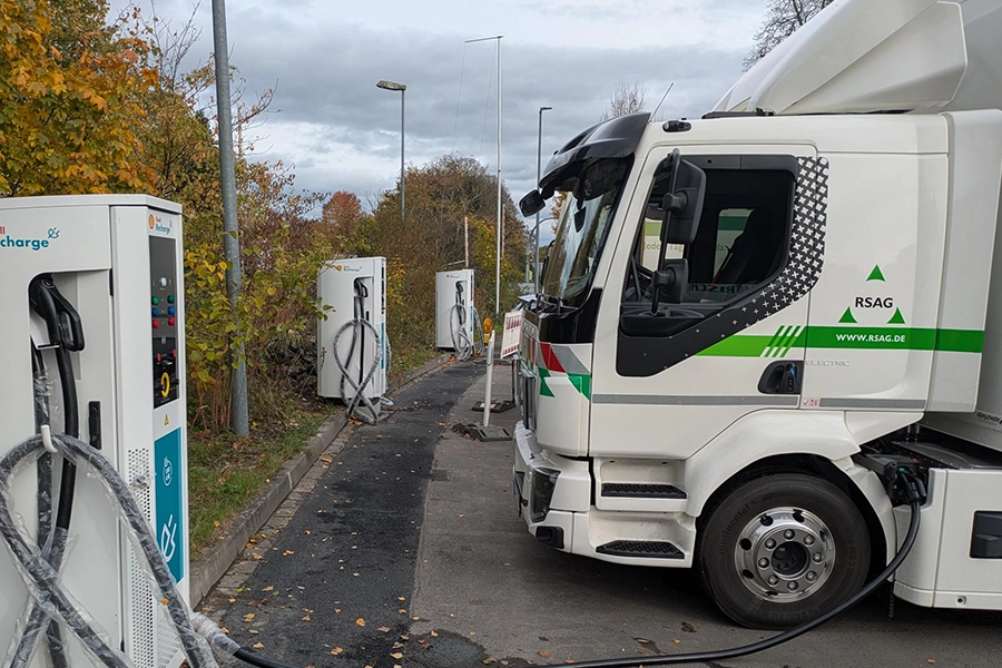 sbrs-related-topic-project-swisttal Electric truck charging at a depot with multiple charging stations
